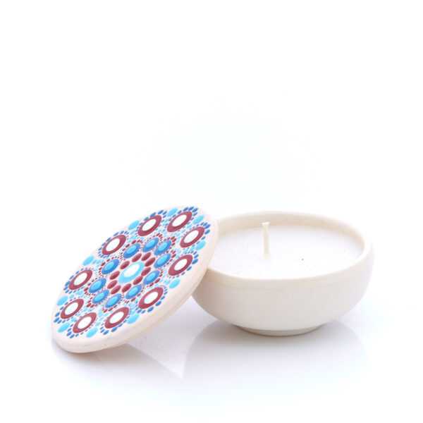 handmade ceramic decoration with candle and colorful details