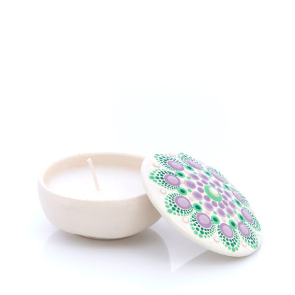 handmade ceramic decoration with candle and colorful details