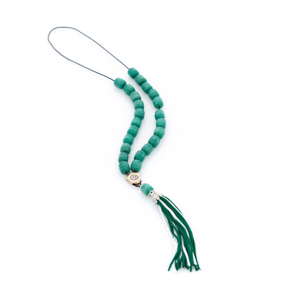 handmade worry bead from incense in green shades with a tassel