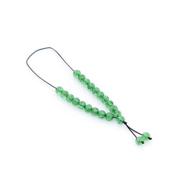 handmade resin worry bead in green shades