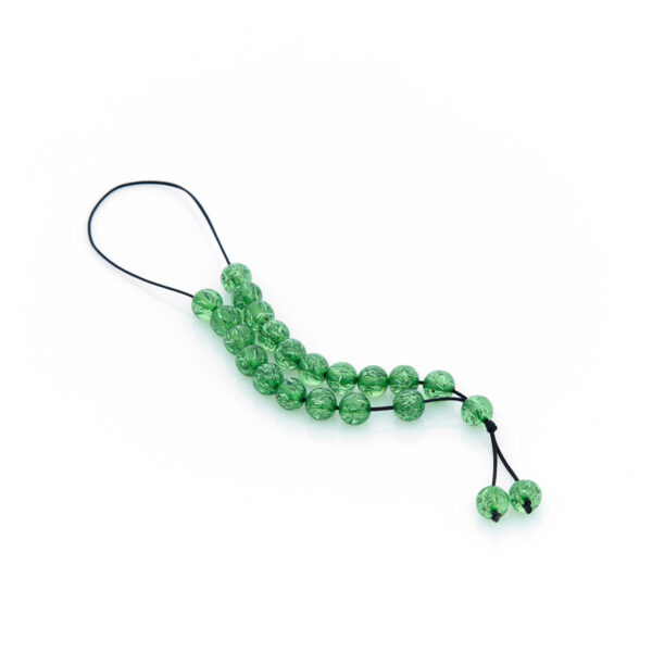handmade resin worry bead in green shades