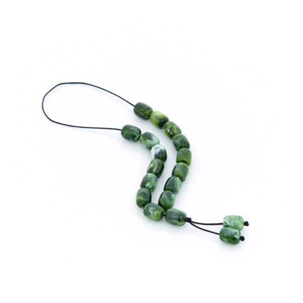 handmade resin worry bead in dark green shades