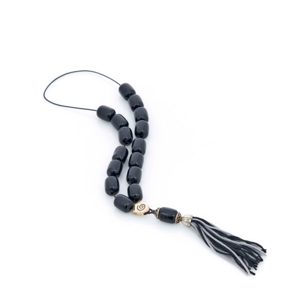 handmade resin worry bead in black shade with tassel
